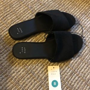 Black suede slip on sandals